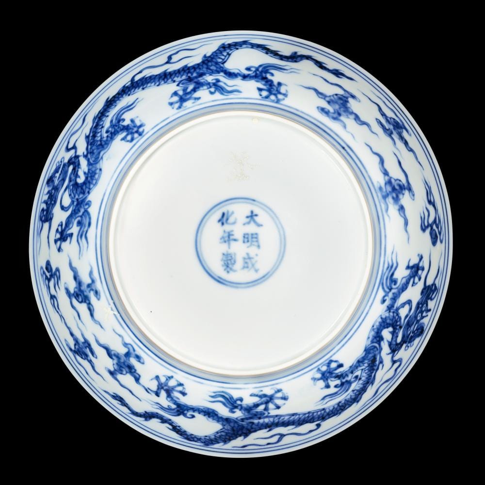 An extremely rare and superb blue and white ‘dragon’ dish Mark and period of Chenghua - 明成化 青花雙龍趕珠紋盤 《大明成化年製》款 comparable sale