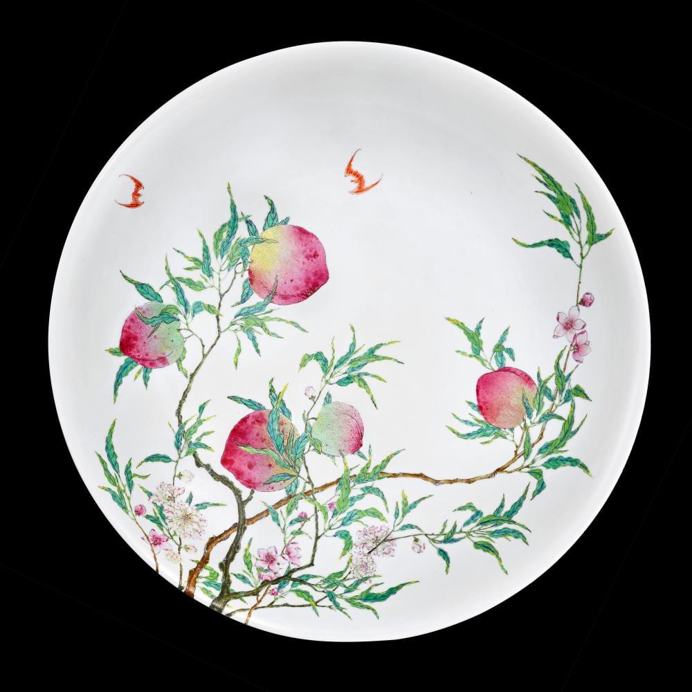 An outstanding and finely enamelled famille-rose 'peach' charger Mark and period of Yongzheng - 清雍正 粉彩過枝福壽雙全紋大盤 《大清雍正年製》款 comparable sale