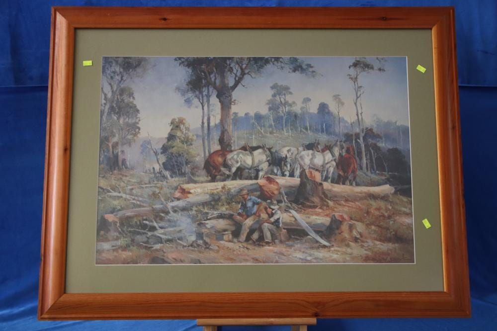 Framed landscape print showing a group of horses pulling wagons through a wooded scene with people and rifles in the foreground.