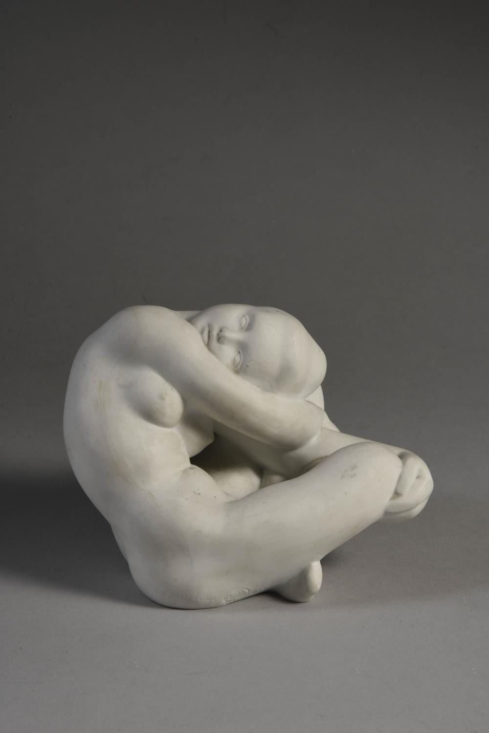 Henri Albert Lagriffoul comparable auction result: henri albert lagriffoul 1907 1981 femme nue assise en tailleur biscuit repr sentant une jeune femme nue assise en tailleur le visage po