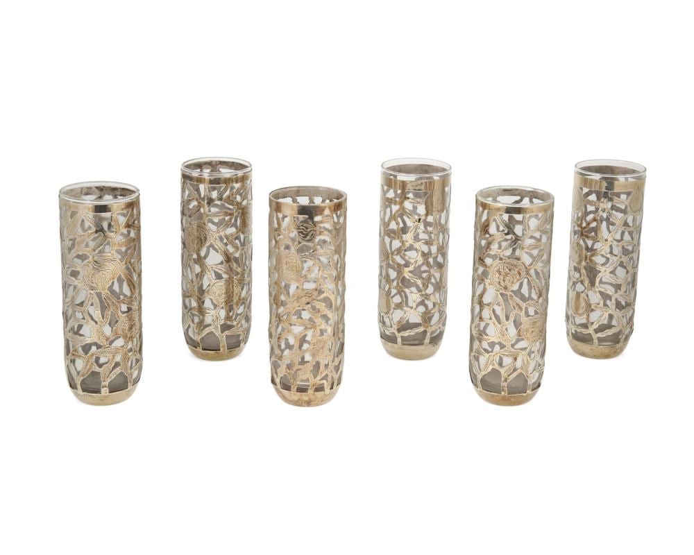 A. Collins comparable auction result: a set of mexican sterling silver overlay collins glasses