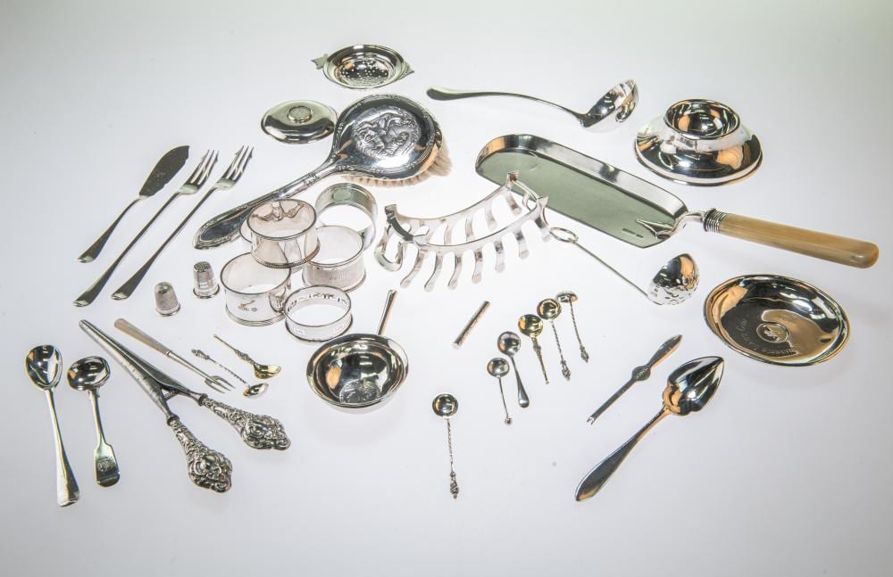 Roberto (1920) Diago comparable auction result: a group of silver including an edwardian ivory handled crumb scoop by rob