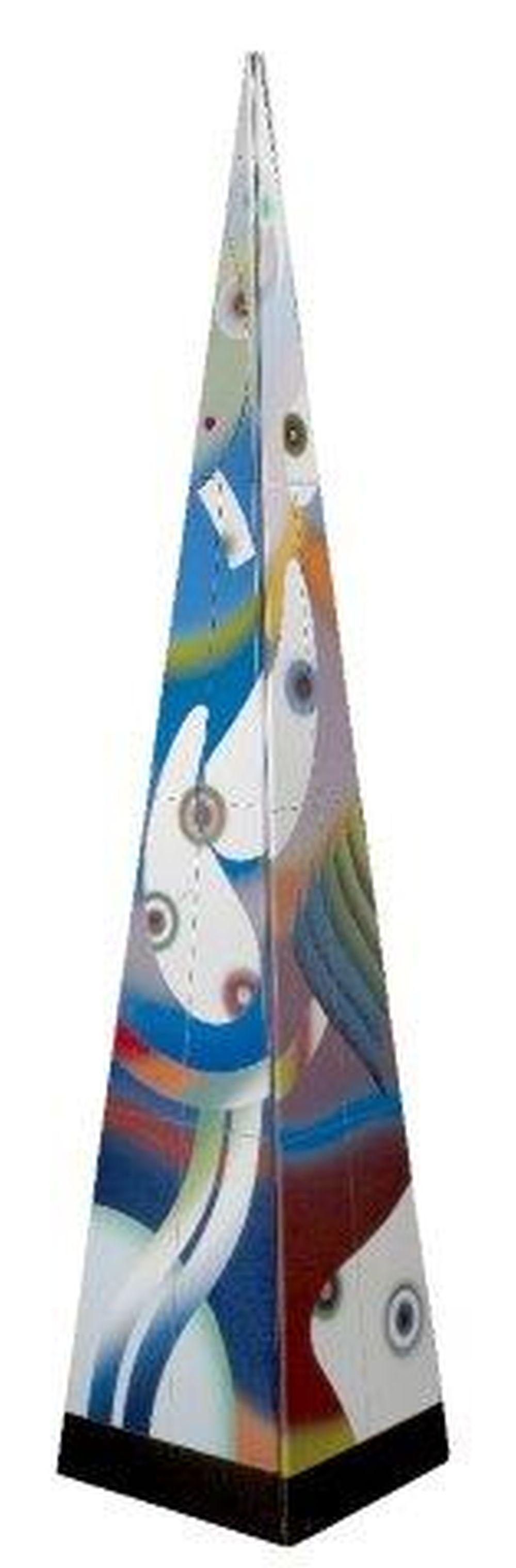 Colorful enamel pyramid sculpture with geometric shapes and circular button-like details on a tall metal base, viewed from the front.