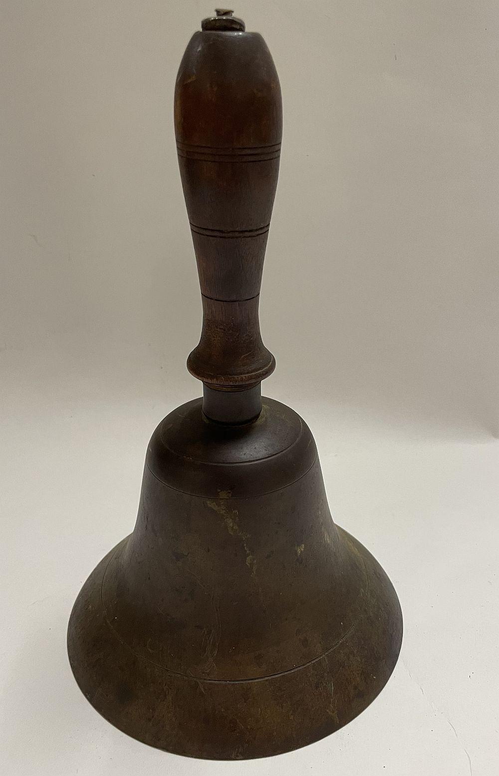 Large Brass Wooden Handled School Bell sold by Asselmeier May Auctions, lot 136 — auction record photograph