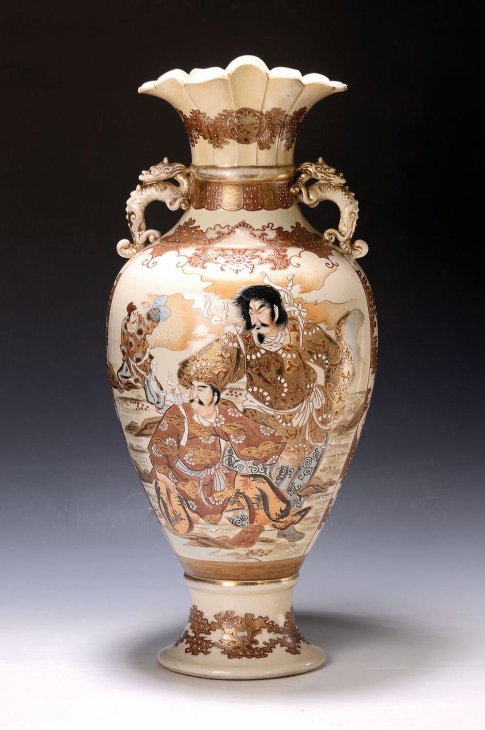 Large cream-colored ceramic floor vase with flared rim and two lion handles, decorated with figures in brown and gold against a cream ground.