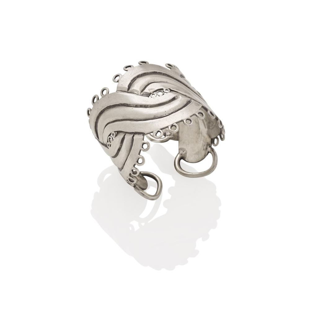 A SILVER CUFF, WILLIAM SPRATLING, CIRCA 1940S sold by Bonhams, lot 187 — auction record photograph