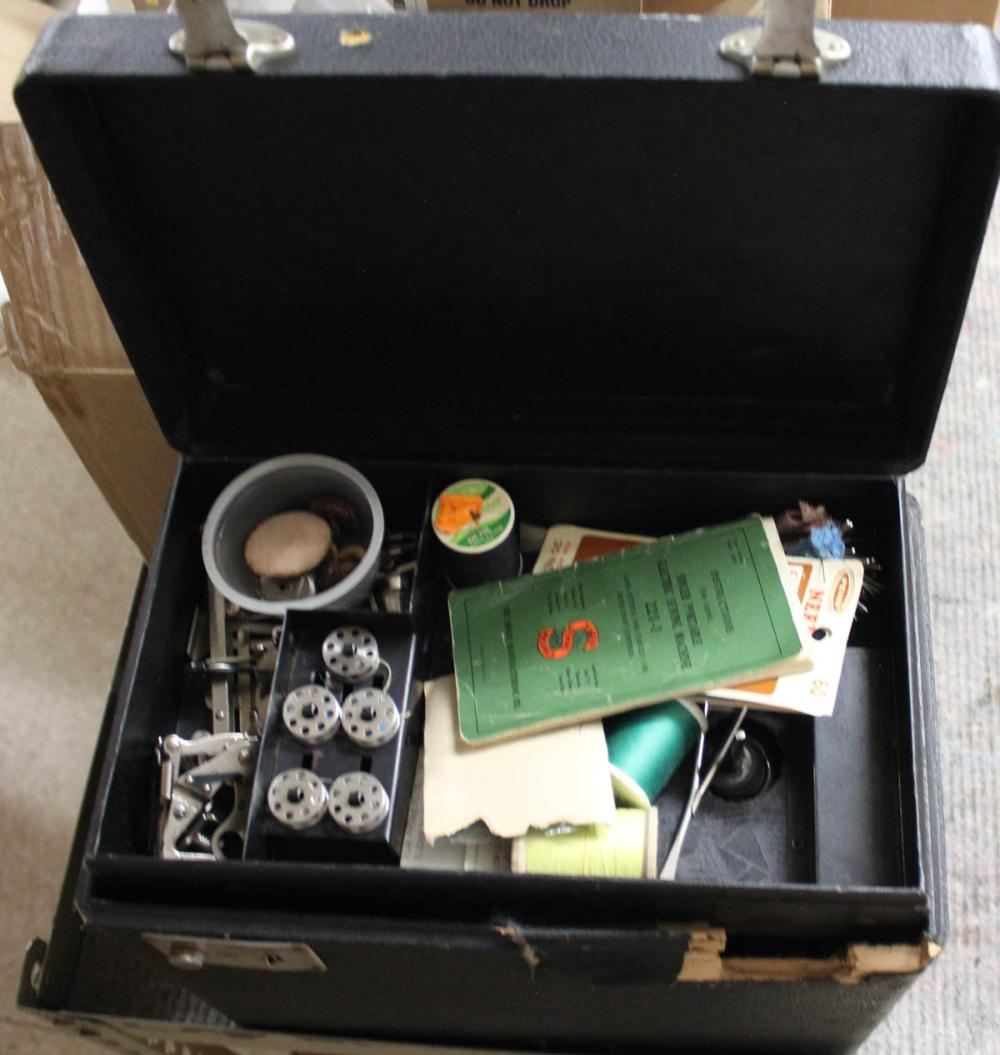 SINGER PORTABLE SEWING MACHINE sold by O'Gallerie, lot 1051 — auction record photograph
