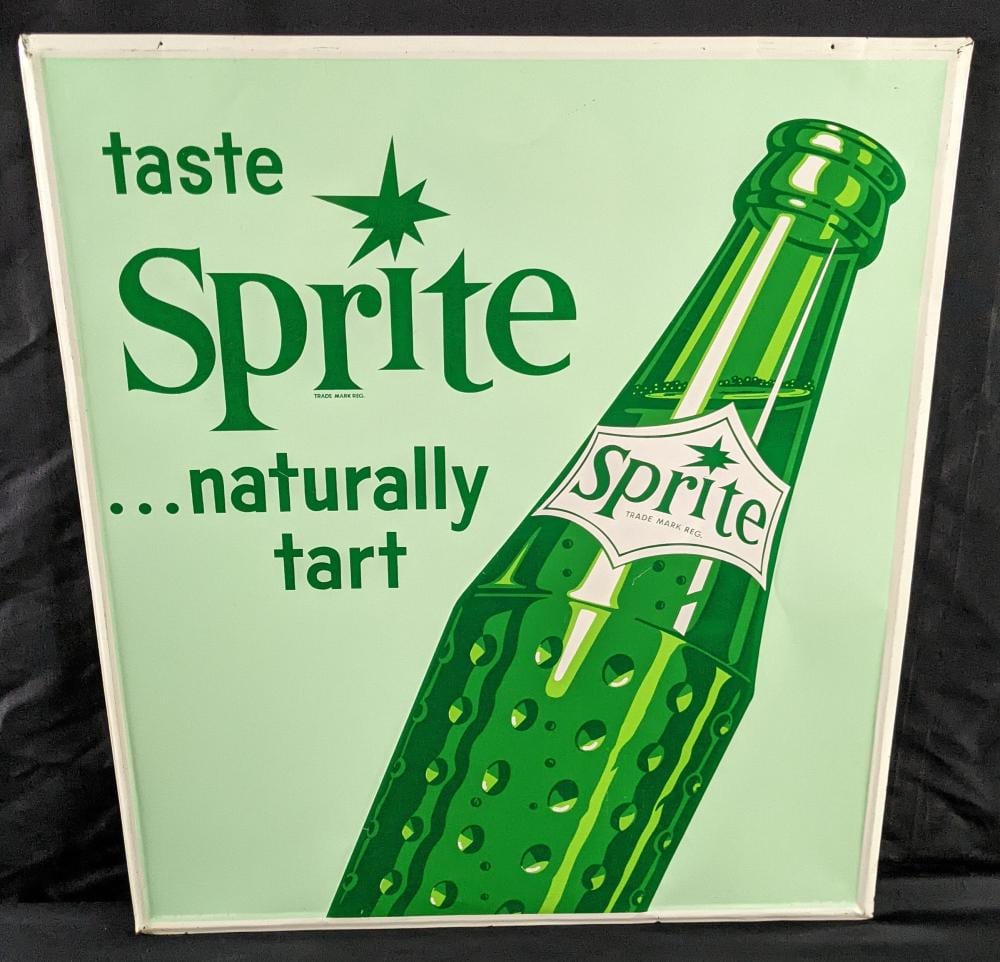 EMBOSSED TIN SIGN SPRITE SODA POP NATURALLY TART sold by Millers Auction Co., lot 46 — auction record photograph