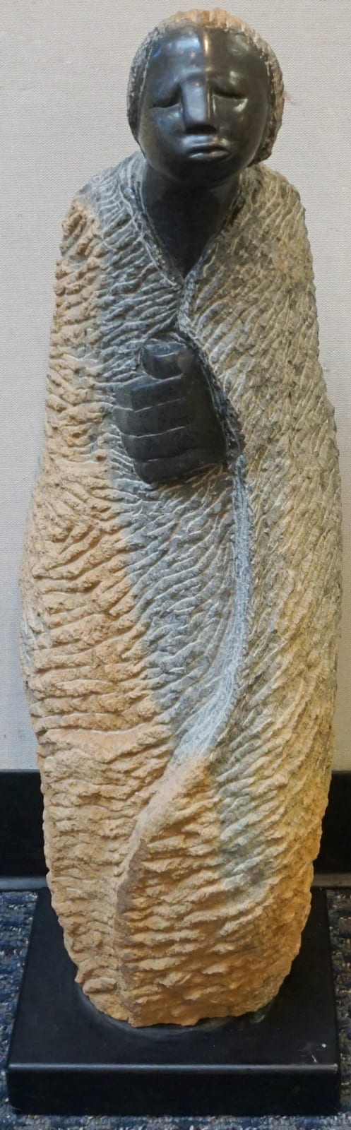 Colleen Madamombe comparable auction result: colleen madamombe zimbabwean 1964 2009 black serpentine and stone figure of a woman h 30 1 2 in 77 47 cm