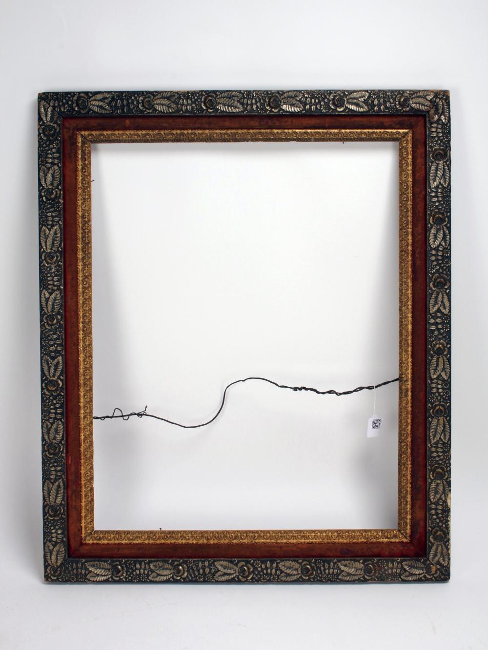 Antique-style carved picture frame with ornate dark blue and gold detailing around a blank white mat.