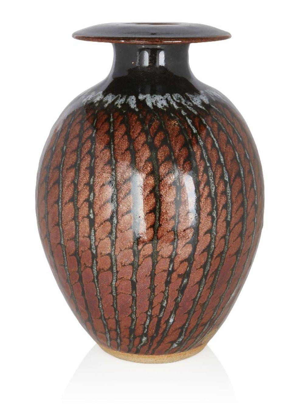 david lloyd jones 1928 1994 large disc rim vase circa 1970s 80s stoneware tenmoku glaze · Roseberys · 2022-09-14 David Lloyd Jones comparable auction result: david lloyd jones 1928 1994 large disc rim vase circa 1970s 80s stoneware tenmoku glaze