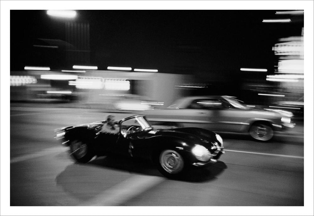 John Dominis comparable auction result: john dominis 1921 2013 l acteur steve mcqueen conduit sa jaguar xk ss sur sunset boulevard