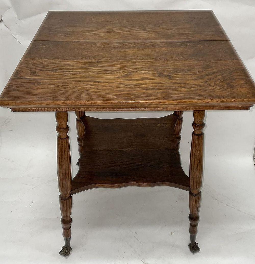 Square Oak Ball And Claw Foot Parlor Table sold by Asselmeier May Auctions, lot 405 — auction record photograph
