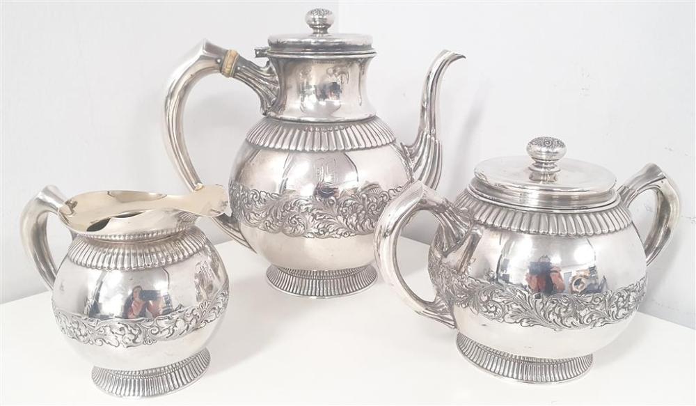 Auction comp thumbnail for A THREE PIECE AMERICAN STERLING SILVER TEA SET, stamp Sterling to base, with pseudo British Hallmarks. (Raffan Kelaher & Thomas, Lot 471)