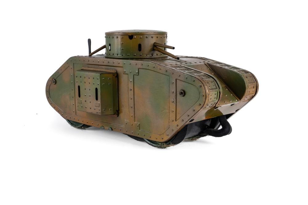 Willis Bing Davis comparable auction result: bing germany camouflage tinplate clockwork tank 1920s wwi british mk iv style hull with multi gun turret there are two lever
