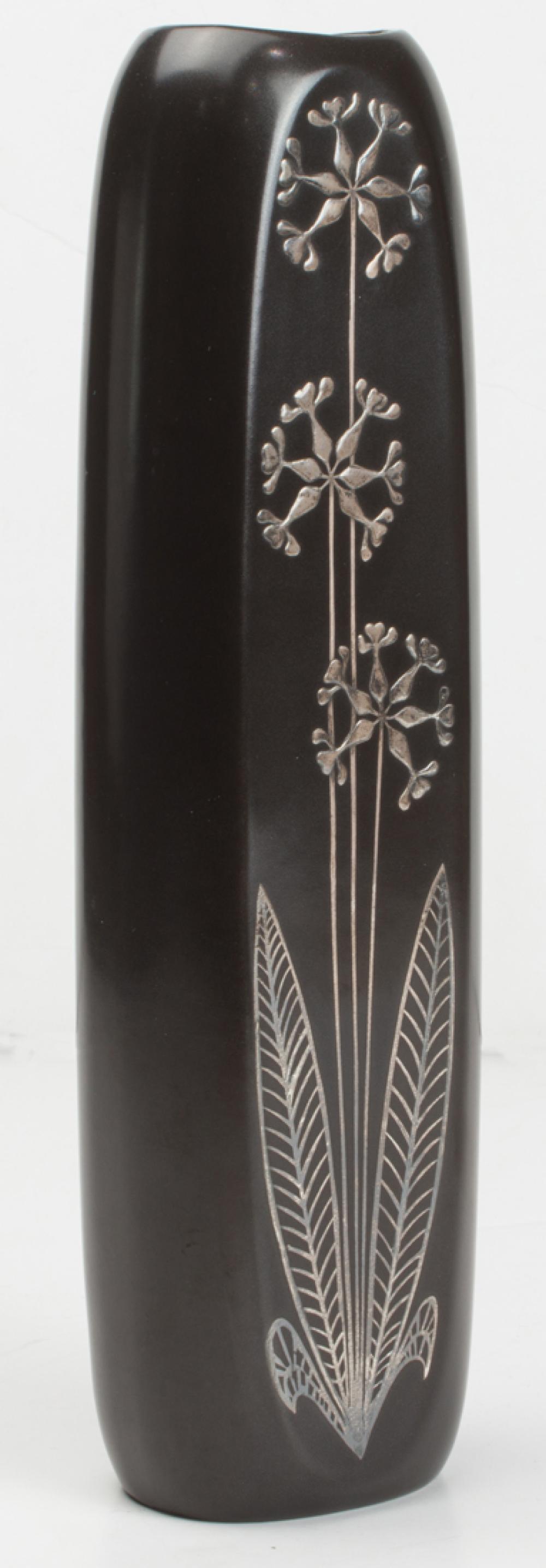 swedish modern gustavsberg silver overlay ceramic facett vase designed by sven jonson · Clars Auctions · 2022-10-15 Sven Jonson comparable auction result: swedish modern gustavsberg silver overlay ceramic facett vase designed by sven jonson