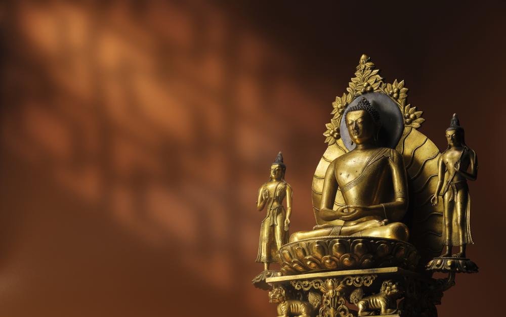 A Gilt Copper Alloy Shakyamuni Buddha Triad Qing Dynasty, 18TH CENTURY comparable sale