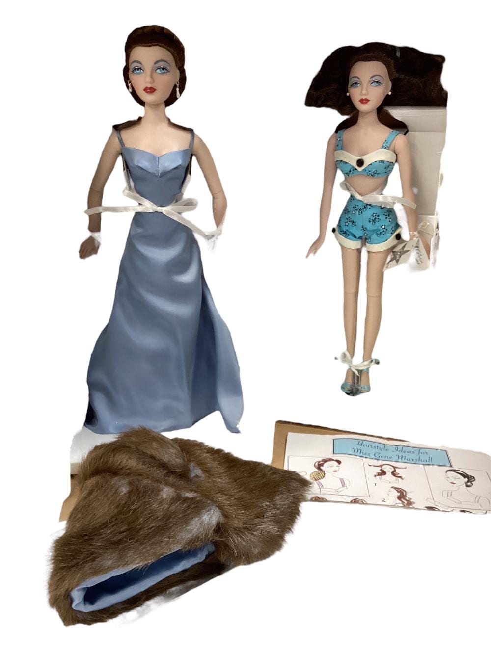 Pair of 16" The Ashton-Drake Galleries, Mel Odom, Gene Marshall doll "Simple Gene and "Blue Fox." NIB, COA's. sold by Apple Tree Auction Center, lot 1758 — auction record photograph