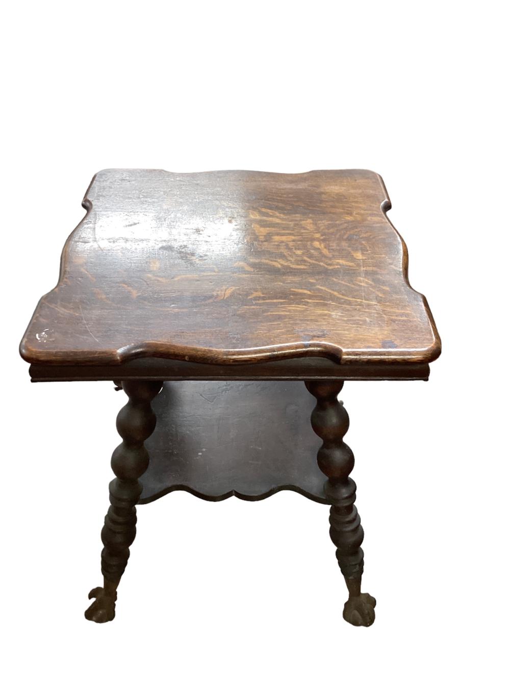 Antique oak claw and glass ball foot parlor table. It measures 22” x 22” x 28” high. sold by Apple Tree Auction Center, lot 2437 — auction record photograph