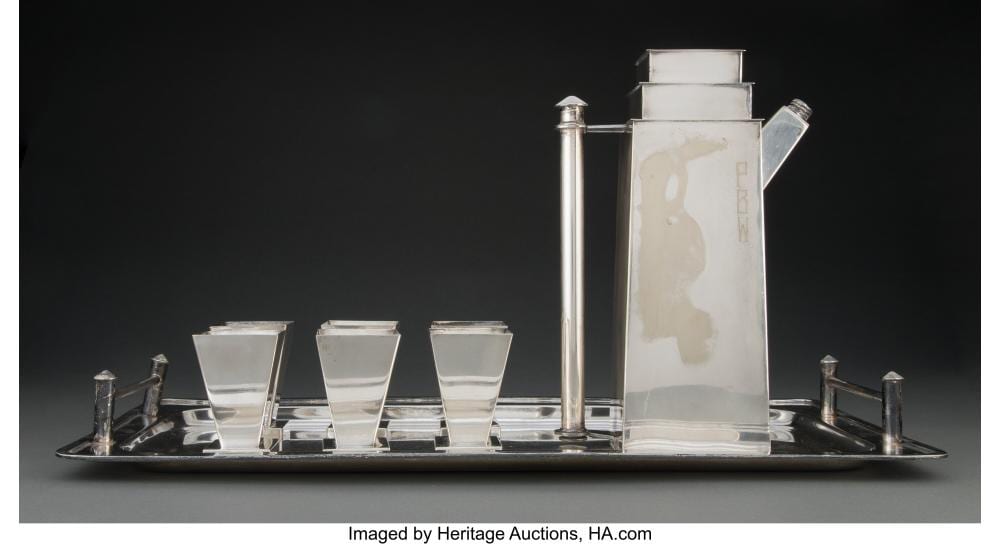 Louis W. Rice comparable auction result: louis w rice american 1872 1933 skyscraper cocktail shaker with tray and six