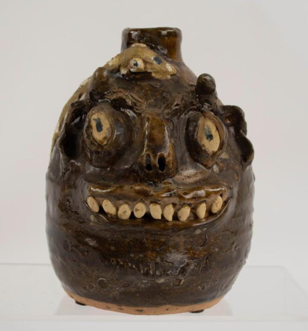 Marie Rogers comparable auction result: marie rogers devil and snake jug