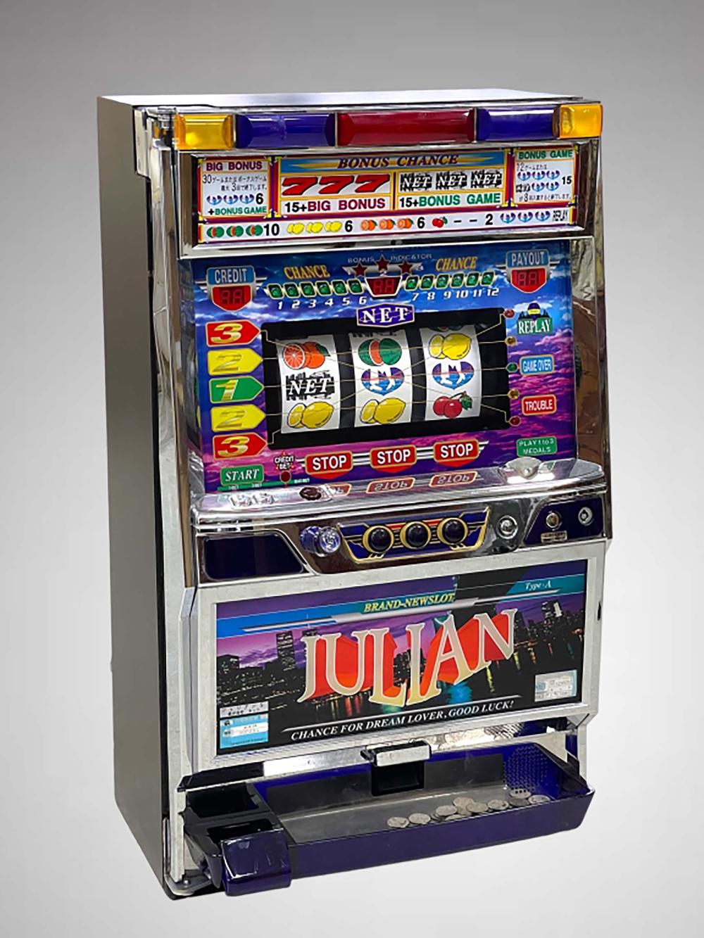 Front view of a vintage-looking slot machine with colorful bonus and net reels, buttons labeled STOP and START, and a JULIAN brand panel.