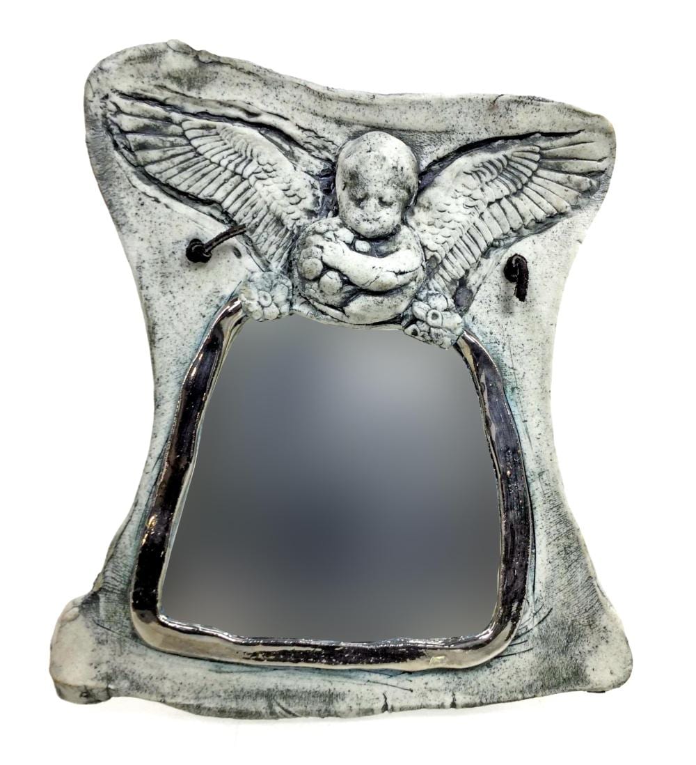 John McNulty comparable auction result: john mcnulty signed pottery angel mirror