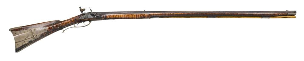 Jennuarrie comparable auction result: very fine silver mounted flintlock rifle by jud