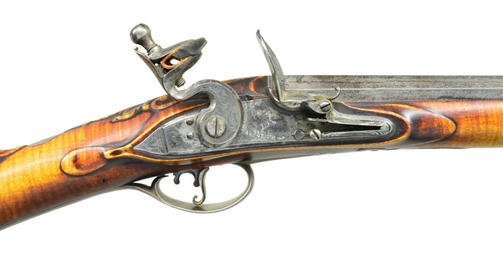 Jennuarrie comparable auction result: fine silver mounted flintlock fowler by jud