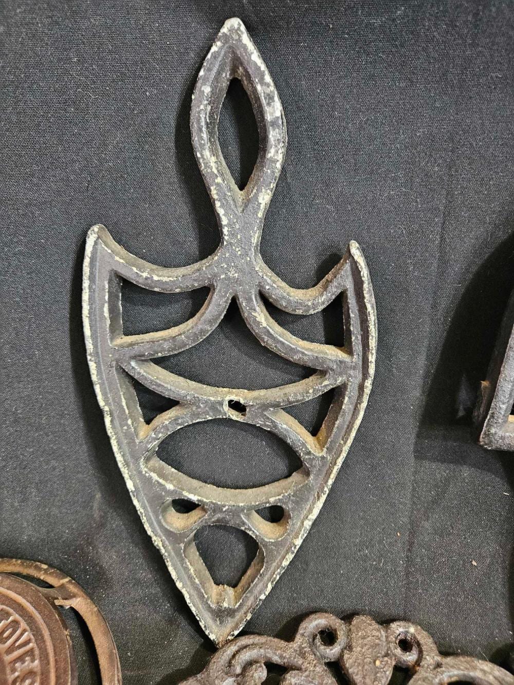 Cast Iron Trivets sold by Atlee Raber Auctioneer, lot 273 — auction record photograph
