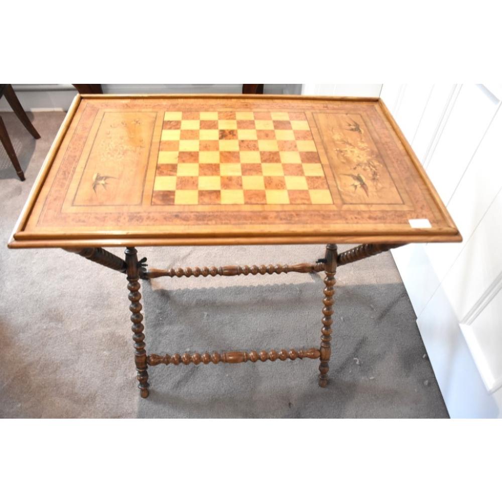 A fine quality 19th century Italian olive wood and amboyna travelling chess table having bird and floral marquetry inlay. H 69cm, W 79cm sold by Christian McCann Auctions, lot 519 — auction record photograph