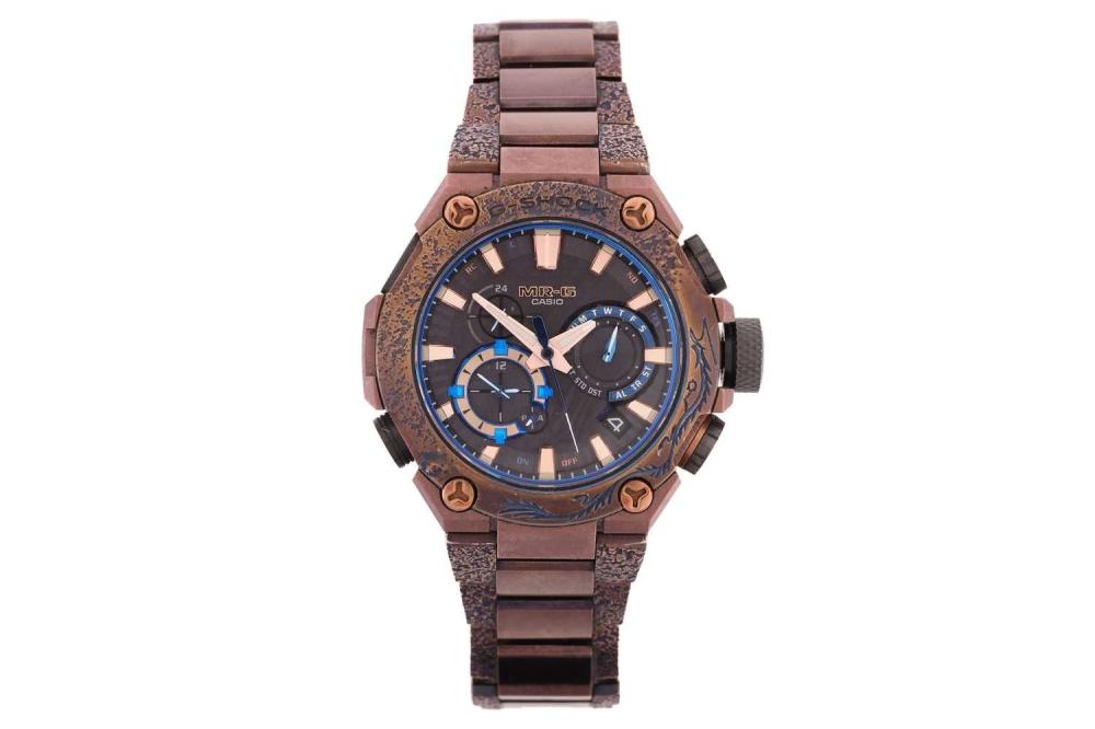 A Casio G-Shock MR-G limited edition MRG-B2000SH-5A MRG Shougeki-Maru Samurai Helmet Masao Kobayashi watch, featuring a Japanese digital and quartz movement with multi-function dial, Bluetooth app function, multi timezones, in a recrystallized... sold by Dawsons Auctioneers, lot 357 — auction record photograph