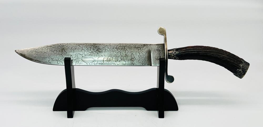 Auction comp thumbnail for Rare Southern & Richardson Sheffield Bowie Knife, Damascus Blade, Sterling, w/ Sheath (Worthington Galleries, Lot 288F)