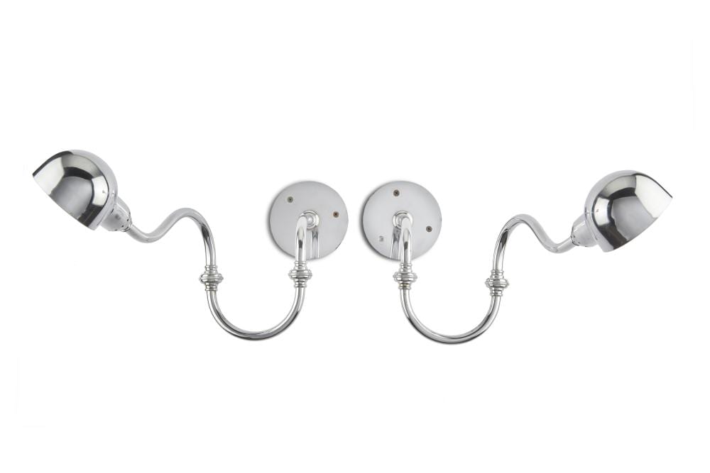 Luigi Caccia Dominioni Pair of wall lights with jointed arm and adjustable reflector model "LP15 Tromba". Produced by Azucena, Milan, 1964. Nickel-plated brass. (max. extension cm 56; plaque d cm 11) (defects) Literature Azucena. Mobili e... sold by Il Ponte Auction House, lot 284 — auction record photograph