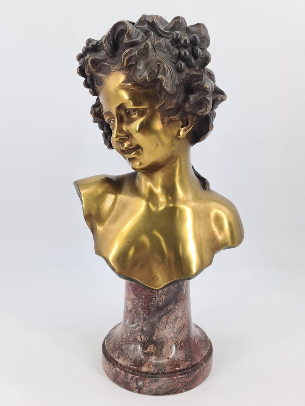 Alphonse-Henri Nelson comparable auction result: alphonse henri nelson 1849 1910 buste de bacchus enfant bronze et base en marbre ht 40 cm