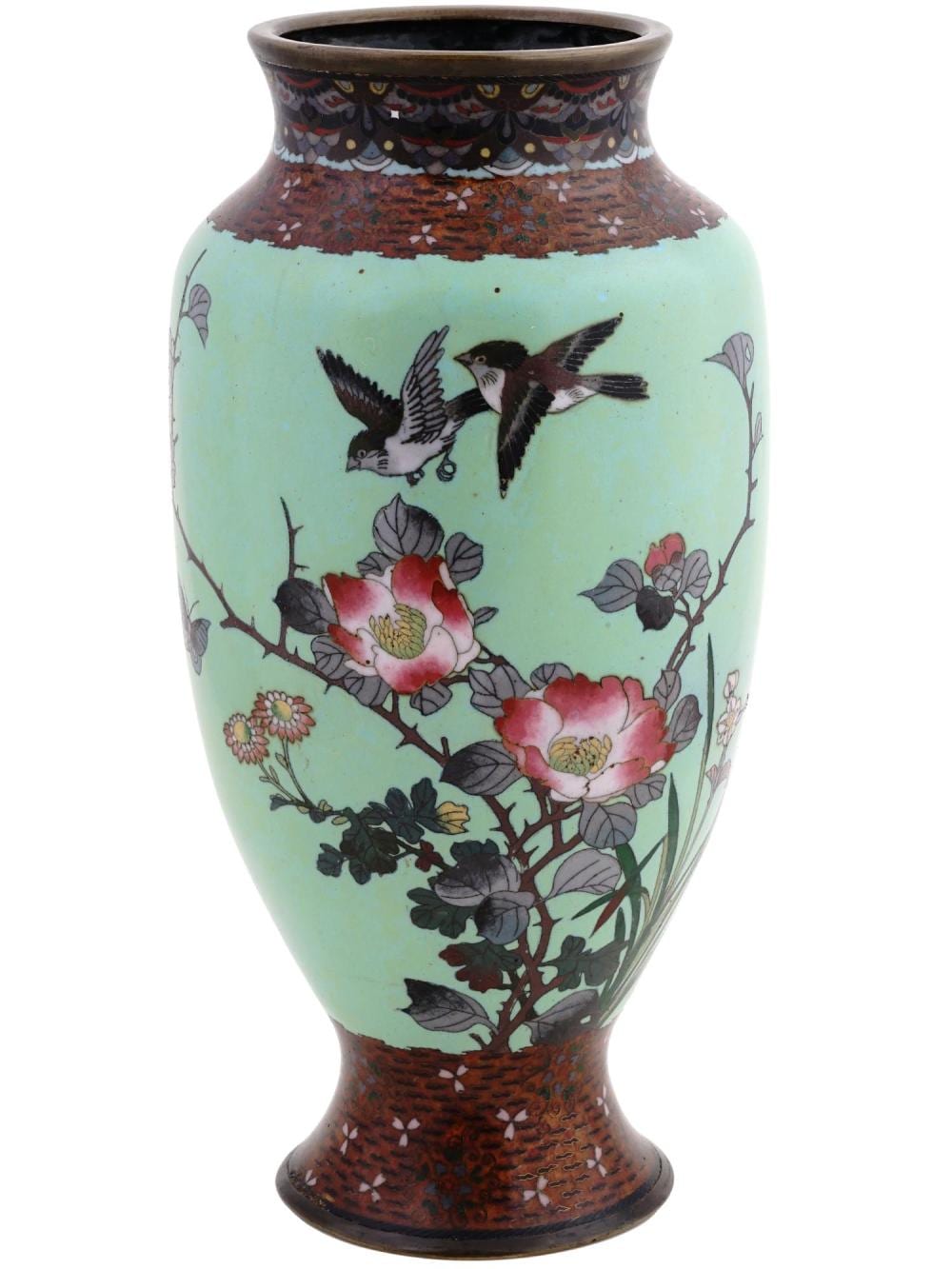 Green and red cloisonné enamel brass Japanese-style vase with birds in flight and pink flowers, flared rim and narrow neck.