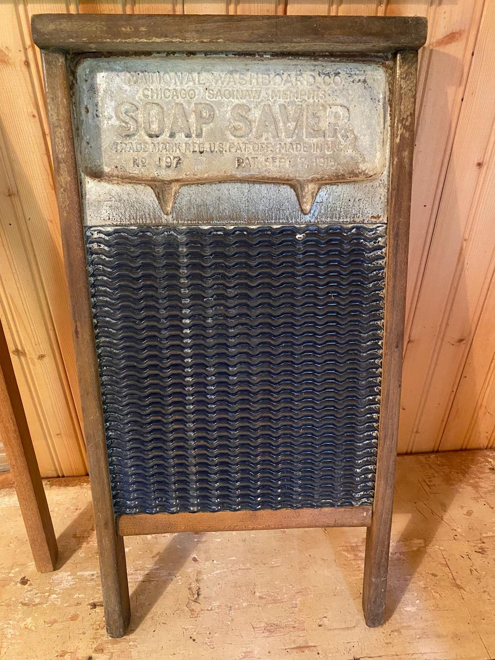 Antique National Washboard Co Soap Saver #197 Blue Enamel Porcelain 25 x 12 in. (63.5 x 30.5 cm.) sold by Asselmeier May Auctions, lot 161 — auction record photograph