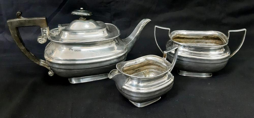 Sterling silver teapot with readable hallmarks and complete service components