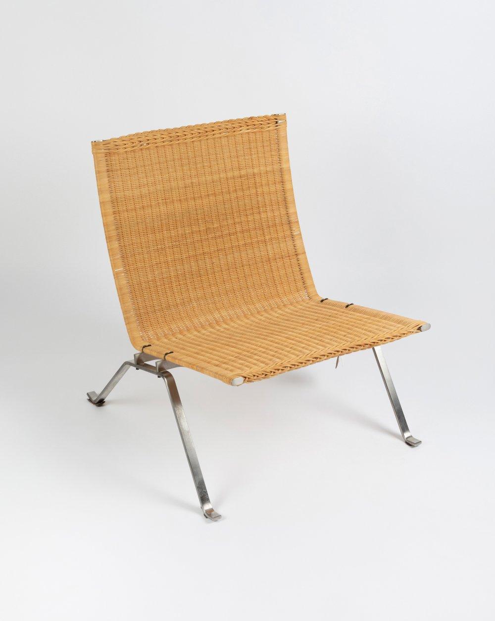 POUL KJÆRHOLM (Denmark, 1929 - 1980) for FRITZ HANSEN. PK-22 chair, original design 1955. Wicker. Metal frame. With manufacturer's label, Fritz Hansen, 2018. sold by Setdart Auction House, lot 39 — auction record photograph