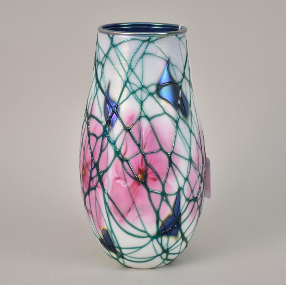Auction comp thumbnail for Charles Lotton Flora Iridescent Art Glass Vase - An ovoid art glass vase with flower pattern in pink white and green, with iridescence and green Inscribed "Charles Lotton 1977". 7 7/8" h. (Bill Hood & Sons Arts & Antiques Auctions, Lot 399)