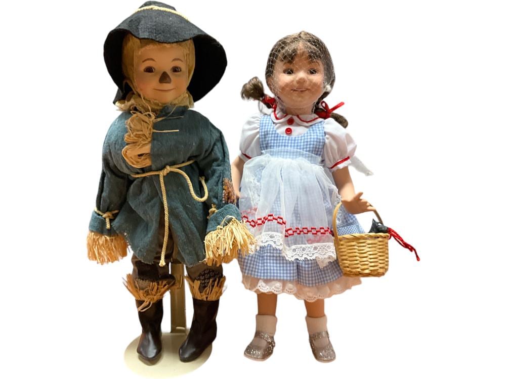 (2) OOB Porcelain “Wizard of Oz” Dolls by Ashton Drake sold by Apple Tree Auction Center, lot 56 — auction record photograph