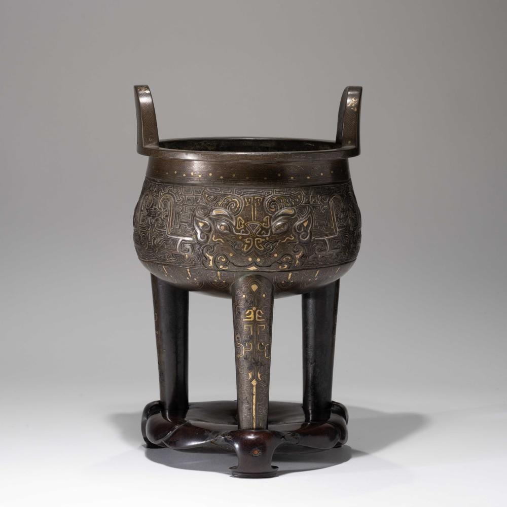 A Chinese Gold And Silver Inlaid Bronze ‘Taotie’ Tripod Censer, QING DYNASTY comparable sale