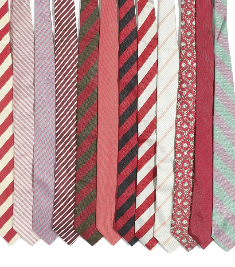 A. Moore comparable auction result: a selection of twelve silk ties belonging to sir roger moore