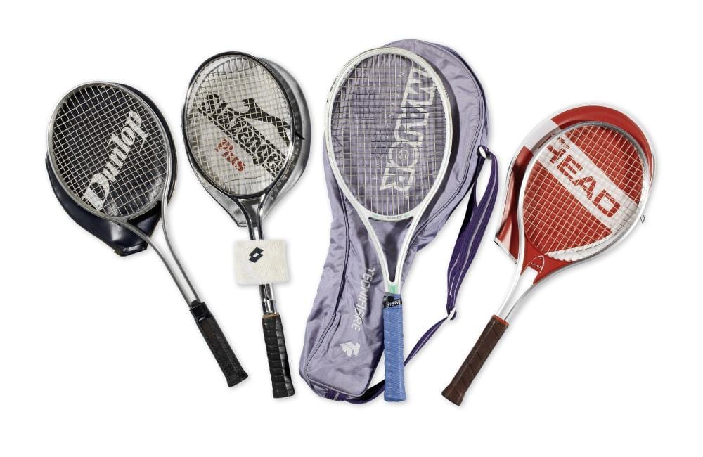 A. Moore comparable auction result: a selection of four modern tennis rackets belonging to sir roger moore