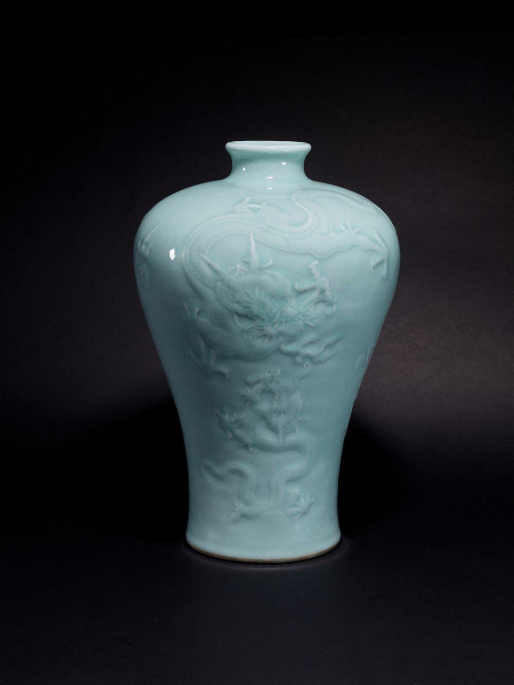 A fine, superb and possibly unique carved celadon-glazed 'dragon' vase, meiping, Seal mark and period of Qianlong | 清乾隆 粉青釉淺浮雕五龍圖梅瓶 《大清乾隆年製》款 comparable sale