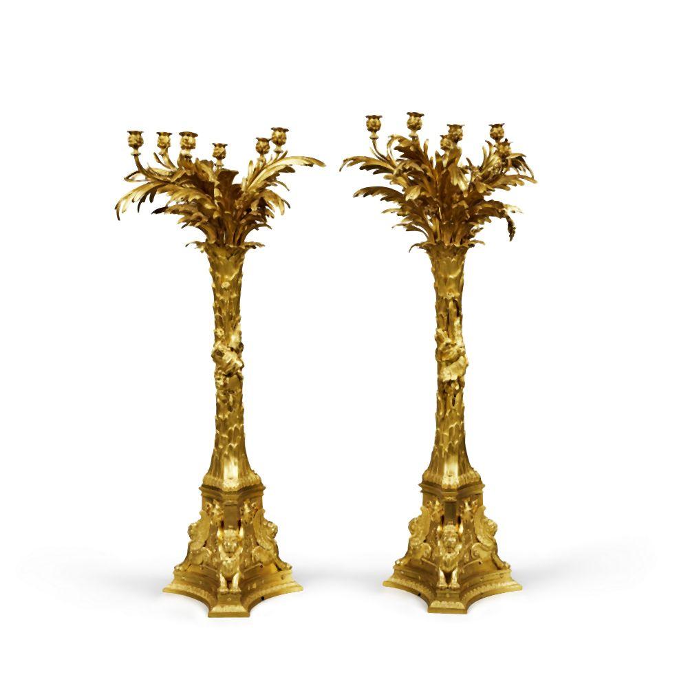 A Pair of Large Royal German Neoclassical Gilt-Bronze Six-Light Candelabra, made for the Throne Room of the Residential Palace in Darmstadt, Probably Berlin, Circa 1810-25, The Design attributed to Karl Friedrich Schinkel sold by Sotheby's, lot 149 — auction record photograph