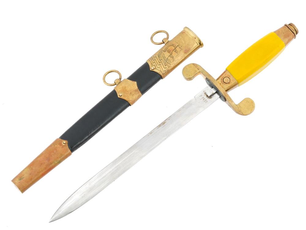 Soviet-style naval dagger with black and yellow handle and gold-toned hilt, shown with its scabbard.
