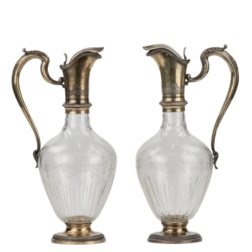 Pair of elegant glass jugs with gilded silver. ODIOT. End of the 19th century. sold by Antiqon, lot 149 — auction record photograph