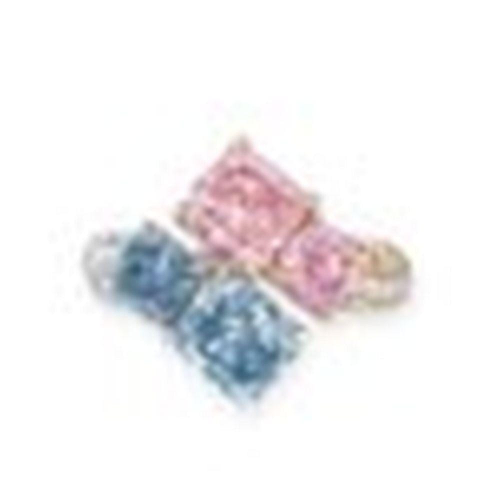 A Superb Coloured Diamond And Diamond RING comparable sale