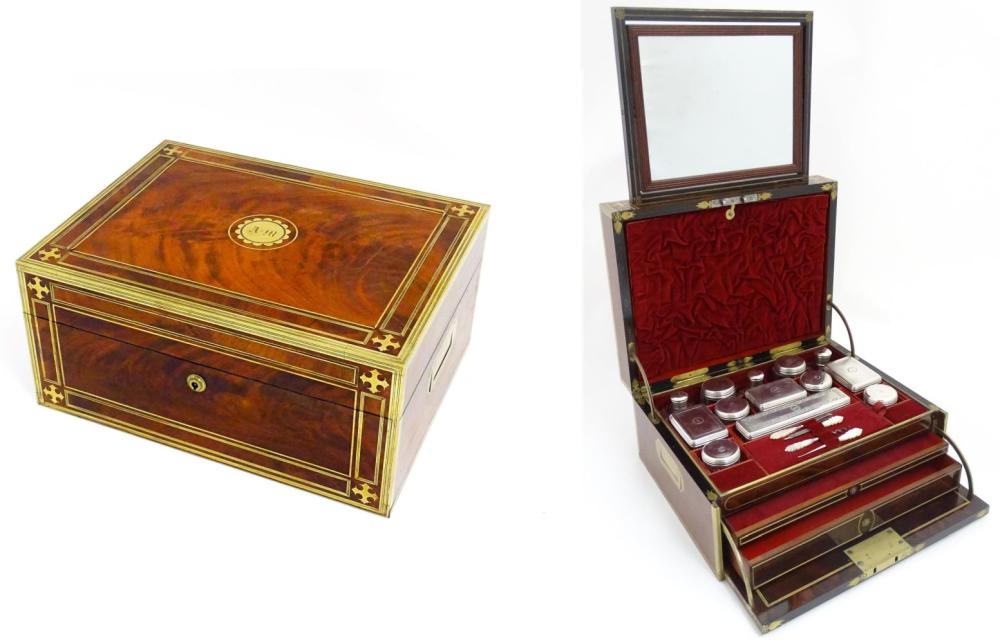 An early 19thC brass bound mahogany military / travelling vanity case / box with twin campaign handl sold by Claydon Auctioneers, lot 1137 — auction record photograph